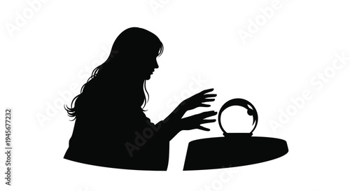 A woman gazes into a crystal ball a striking black silhouette