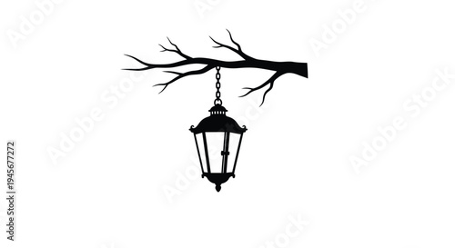 A hanging lantern beneath a bare tree branch stark silhouette