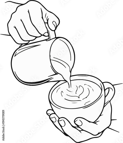 Two hands prepare a hot beverage by pouring steamed milk into a coffee cup