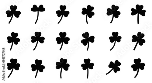 A collection of twenty black silhouette shamrocks arranged in five rows and four columns on a white background, showcasing the iconic symbol of Ireland