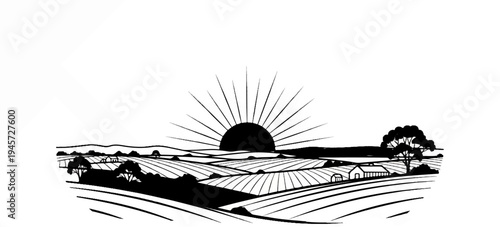 Sunrise over a rural landscape with fields, trees, and farm buildings
