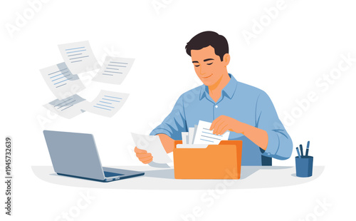 Man organizing papers and documents at his desk with a laptop and filing folder. A man in a blue shirt is sorting through papers and files at his desk, with a laptop and a pen
