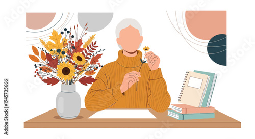 Creative Woman with Autumn Flowers, Books, and Abstract Shapes