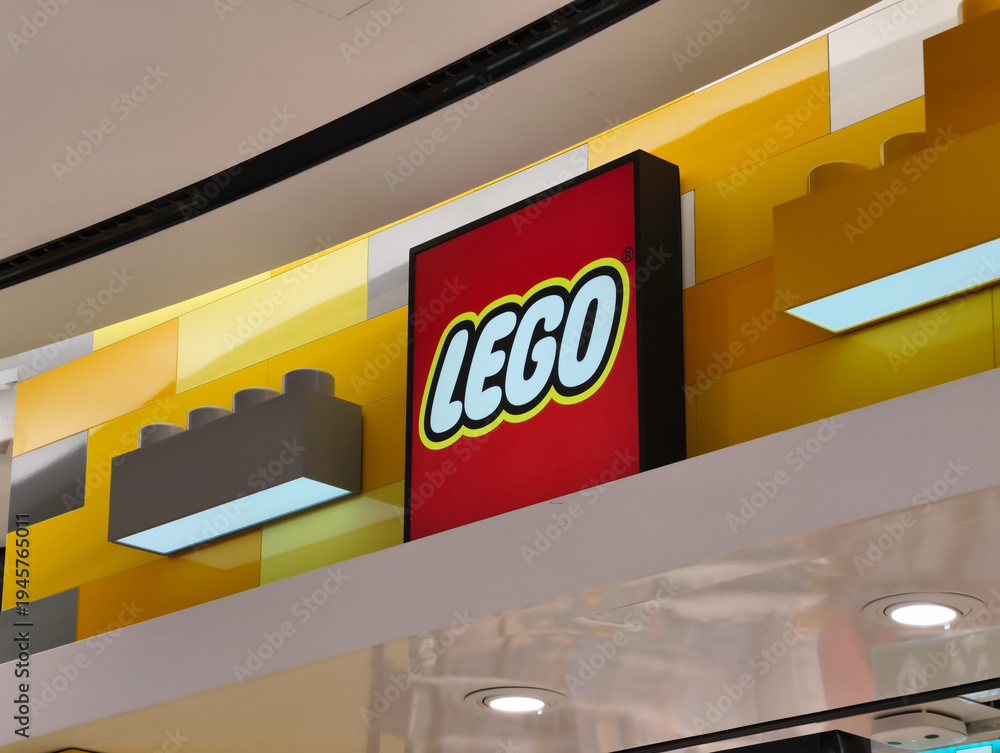 Obraz premium Prague, Czech Republic, March 12, 2026 – Exterior view of Lego store signage and logo at a shopping mall. Editorial photography of a retail shop entrance in the commercial district during business 