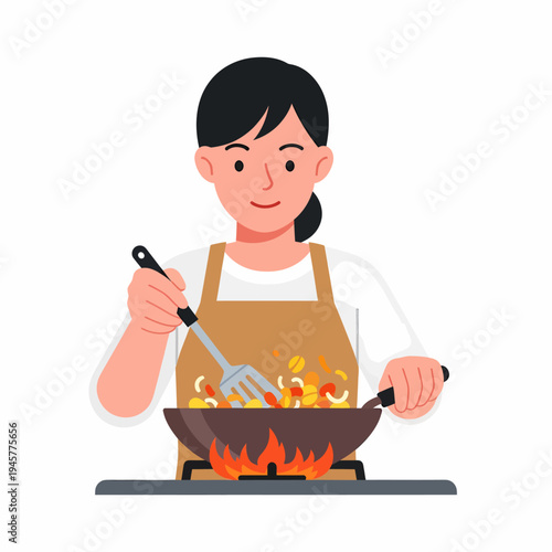 A woman in an apron is stir-frying vegetables in a wok on a gas stove, using a spatula to mix the ingredients.