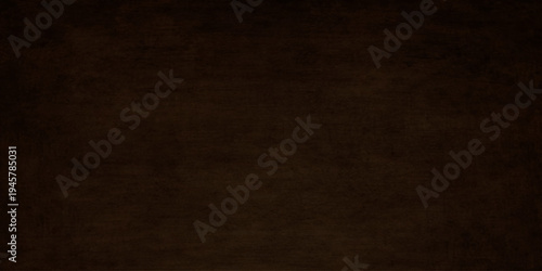 A vintage brown parchment background features a dark grunge paper texture with an aged, stained surface and ancient antique design elements for a retro blank material backdrop