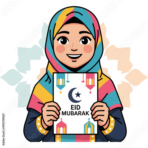 A young girl wearing a hijab cheerfully holds up an Eid Mubarak sign outdoors.