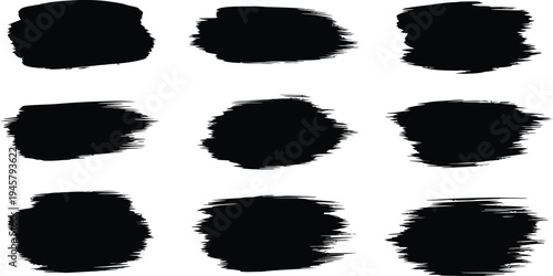 Nine irregular black brush strokes on white background