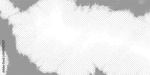 Gray and white abstract pattern of dots and irregular shapes