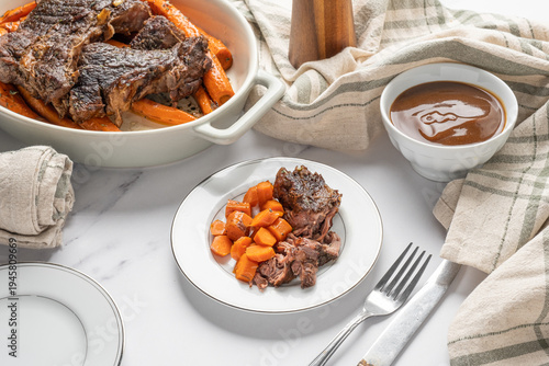 Billede på lærred Beef pot roast with roasted carrots. American food dinner