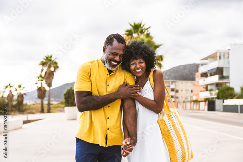 Photos Beautiful mature black couple of lovers dating at the seaside - African senior m