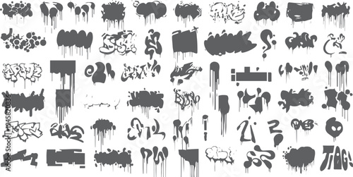 Collection of grey graffiti spray paint drips and tags