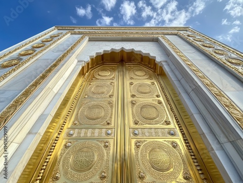 Ornate golden doors of a grand religious building under a partly cloudy sky
