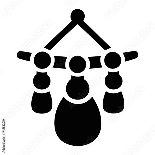 Minimalist black icon of a baby mobile or crib toy for nursery decoration and infant development