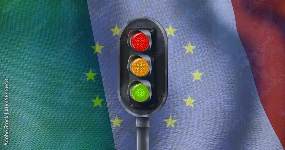 Obraz premium Displaying traffic light on short pole before draped flags with yellow stars, with tricolor lenses