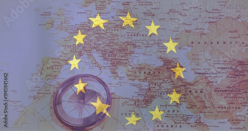 Displaying paper political map of Europe, North Africa and Western Asia, with EU stars and compass