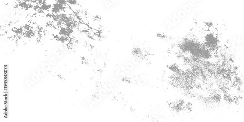 Scattered gray dots and irregular shapes on a white background creating an abstract textured pattern