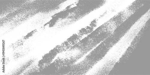 Abstract diagonal streaks of gray and white granular texture background pattern