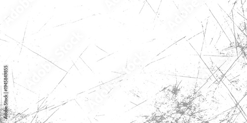 White surface with scattered gray scratches and speckles creating a distressed texture