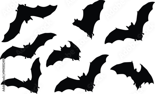 Black bat silhouettes in flight for Halloween party decoration spooky nocturnal animal flying set isolated on white background for gothic and horror design