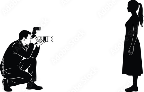 Professional male photographer crouching with DSLR camera and flash taking portrait of young female model standing in studio isolated silhouette.