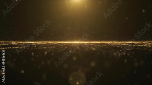 Golden particles drift across a dark background with bright light source above, cinematic motion