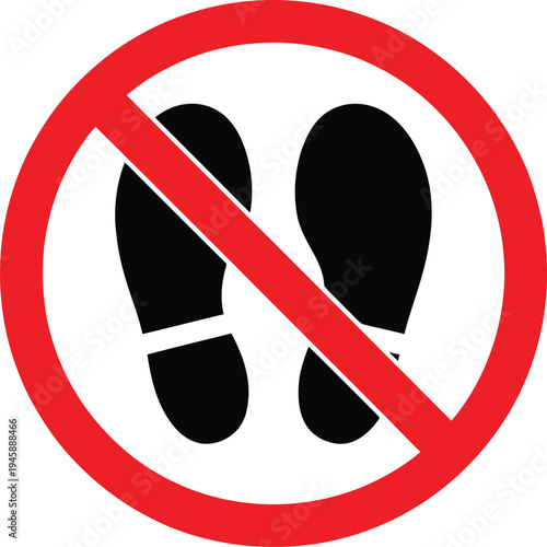 Prohibition sign indicating no walking or standing allowed in specific area