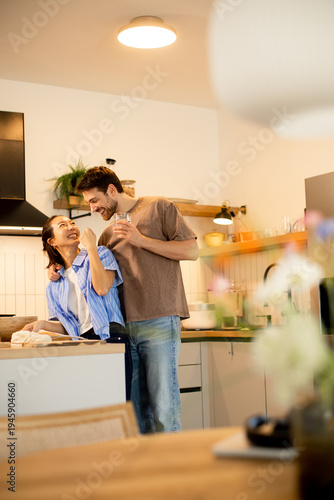 In a cozy kitchen, a couple...