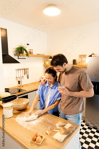 Cooking together in a kitch...