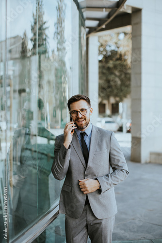 Businessman talking on phon...