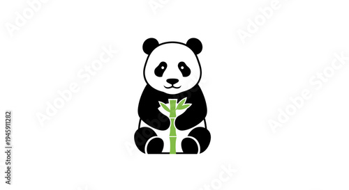 Panda bear eating bamboo shoots peacefully.