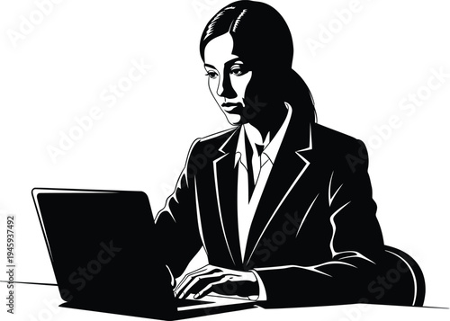 Businesswoman working on laptop computer in office setting