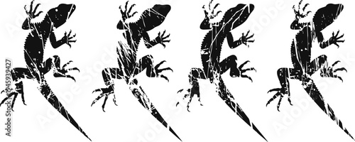 Set of abstract black lizard silhouettes in different dynamic poses on white background