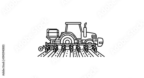 Tractor Plowing Field with Seeder.
