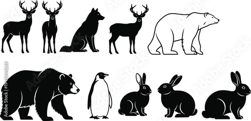 Set of black silhouettes featuring a majestic stag deer, a wolf, a large bear, a penguin, and rabbits isolated on white