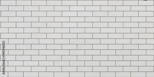 Gray brick wall texture with white bricks and gray mortar lines