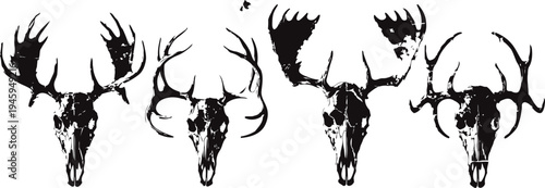 Four black deer skull silhouettes with detailed antlers in various shapes and sizes isolated on white