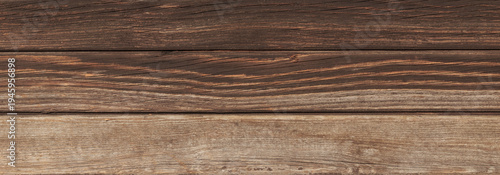 Dark brown wooden planks laid horizontally create a rustic textured background with visible grain and weathered boards, as a backdrop for design, packaging, web layouts, or interior mood imagery.