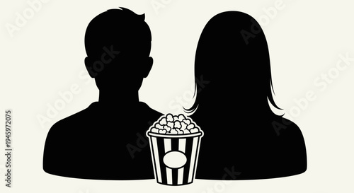 Couple watching movie with popcorn.