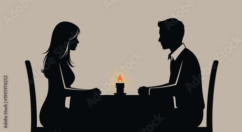 Couple sitting at dinner table.