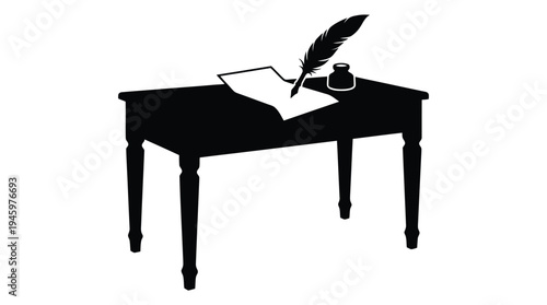 Silhouette of wooden desk with open book quill pen and inkwell