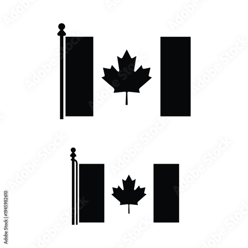 Two variations of the canadian flag displayed on flagpoles
