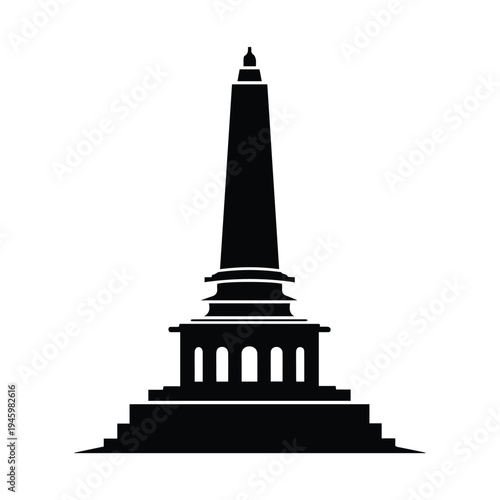 Monumental obelisk atop a classical architectural base with steps.