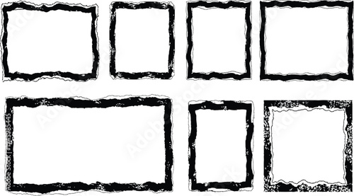 A set of seven blank rectangular frames with torn edges