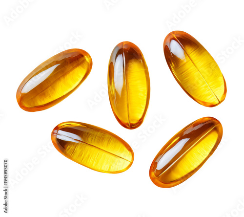 Set of shiny golden capsules or pills isolated on transparent background