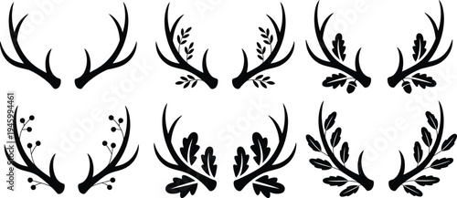 Silhouettes of decorative deer antlers with leaves, branches, berries, foliage, vector illustration for wildlife, nature, rustic design, emblem, art
