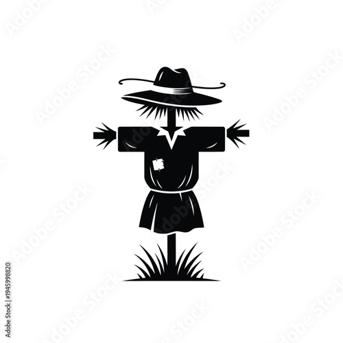 Black silhouette of a scarecrow wearing a hat