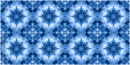 Blue indigo shibori tie dye seamless pattern inspired by traditional Japanese textile techniques. Radial geometric ornament with watercolor effect, suitable for fabric, wallpaper, packaging