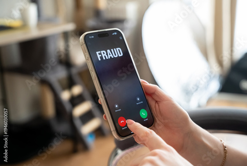 Canvas Print A woman receives a call from scammers