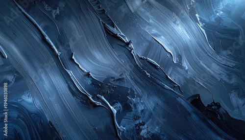 Close-up of thick, textured brushstrokes in various shades of deep blues and grays
